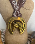Horsehead in Horseshoe with Brown Scarf